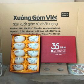 Bộ 10 bát cơm in logo 35 năm thành lập Agribank màu trắng vẽ hoa đào xanh XG-BC18