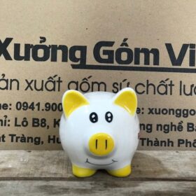 Heo đất in logo Chung tay xây dựng Giáo xứ Thánh Tâm size nhỏ màu vàng XG-HĐ06
