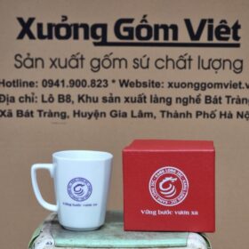 Cốc sứ in logo Kang Long JSC dáng vát có quai màu trắng XG-LS116