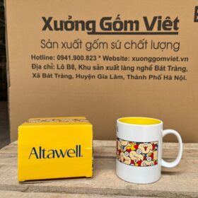 Cốc sứ Bát Tràng in logo Altawell họa tiết hoạt hình màu trắng quai C lòng vàng XG-LS201